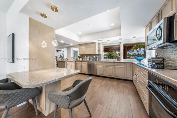 Interior, Kitchen, Pendant Lights, Recessed Lighting, Stainless Steel Appliances, Wood Texture Flooring