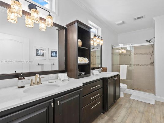 Bathroom, Dual Sink Vanities, Glass Shower, Interior, Wood Texture Flooring