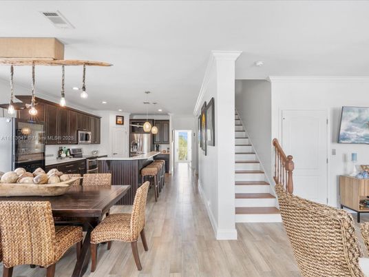 Dining room, Interior, Kitchen, Pendant Lights, Recessed Lighting, Stainless Steel Appliances, Wood Texture Flooring