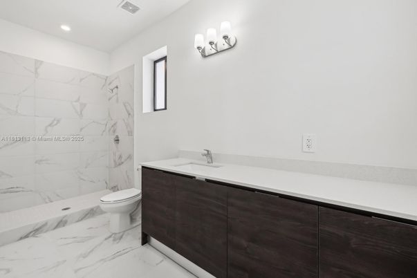 Bathroom, Dual Sink Vanities, Interior, Marble, Marble Walls, Recessed Lighting