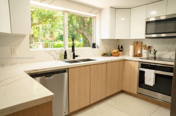 Interior, Kitchen, Marble Walls, Stainless Steel Appliances