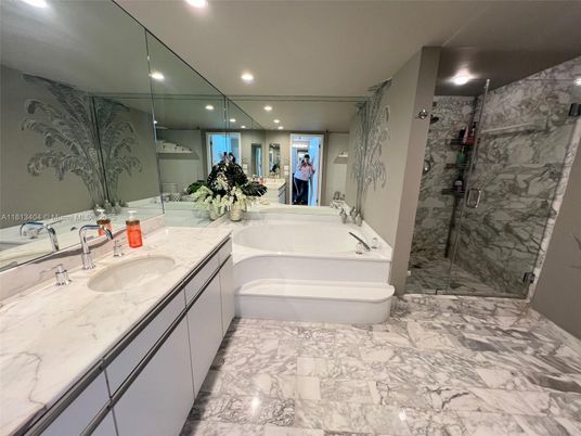 Bathroom, Dual Sink Vanities, Interior, Marble, Marble Walls, Recessed Lighting