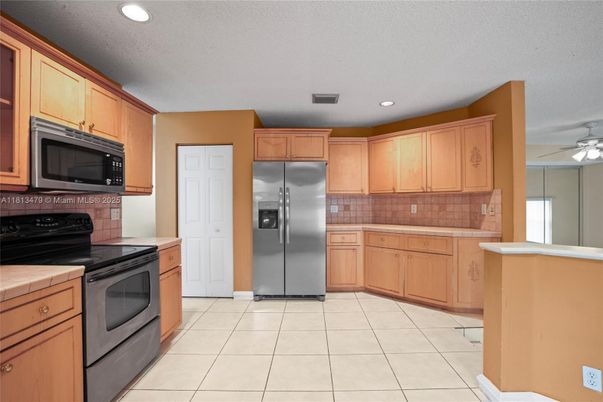 Interior, Kitchen, Recessed Lighting, Tile Countertops