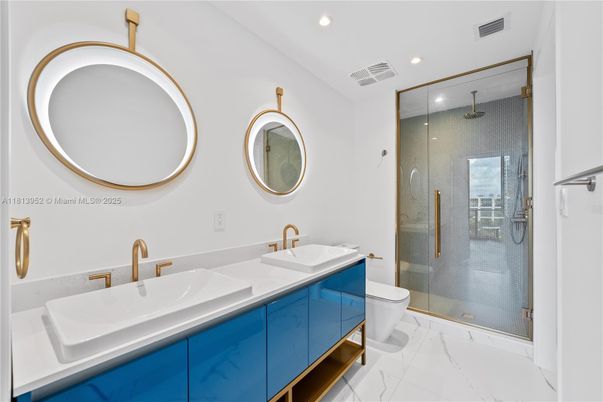 Bathroom, Dual Sink Vanities, Glass Shower, Interior, Marble, Recessed Lighting