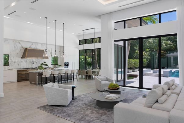 Dining room, Interior, Kitchen, Living room, Marble Walls, Pendant Lights, Recessed Lighting, Stainless Steel Appliances, Wood Texture Flooring