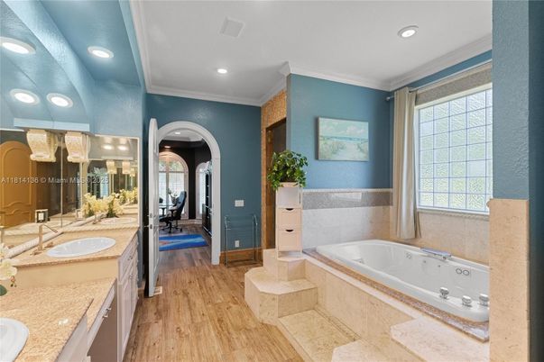 Bathroom, Dual Sink Vanities, Fitness Equipment, Interior, Recessed Lighting, Wood Texture Flooring