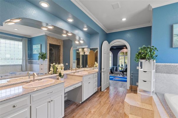 Bathroom, Dual Sink Vanities, Interior, Recessed Lighting, Wood Texture Flooring
