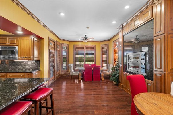 Dining room, Interior, Kitchen, Recessed Lighting, Stainless Steel Appliances, Wood Texture Flooring