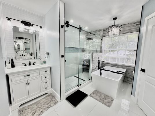 Bathroom, Chandelier, Dual Sink Vanities, Free Standing Baths, Glass Shower, Interior