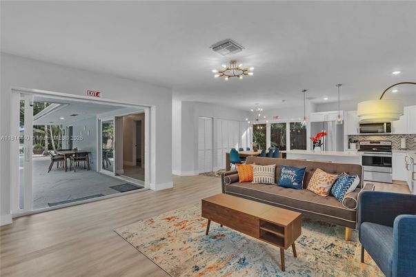 Dining room, Interior, Kitchen, Living room, Pendant Lights, Recessed Lighting, Stainless Steel Appliances, Wood Texture Flooring