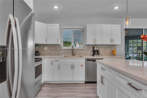 Interior, Kitchen, Pendant Lights, Recessed Lighting, Stainless Steel Appliances, Wood Texture Flooring