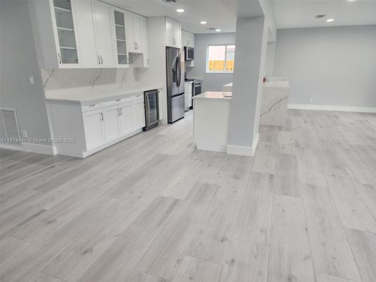 Interior, Kitchen, Marble Walls, Recessed Lighting, Wood Texture Flooring