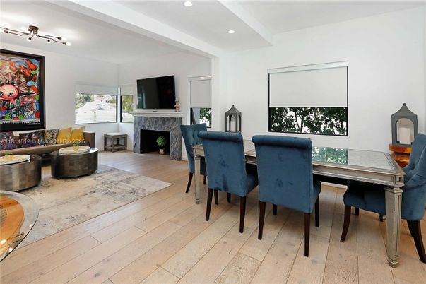 Dining room, Fireplace, Interior, Living room, Recessed Lighting, Wood Texture Flooring
