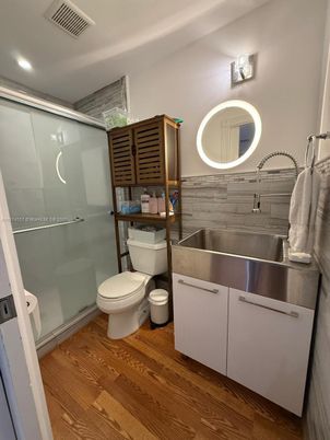 Bathroom, Glass Shower, Interior, Recessed Lighting, Wood Texture Flooring