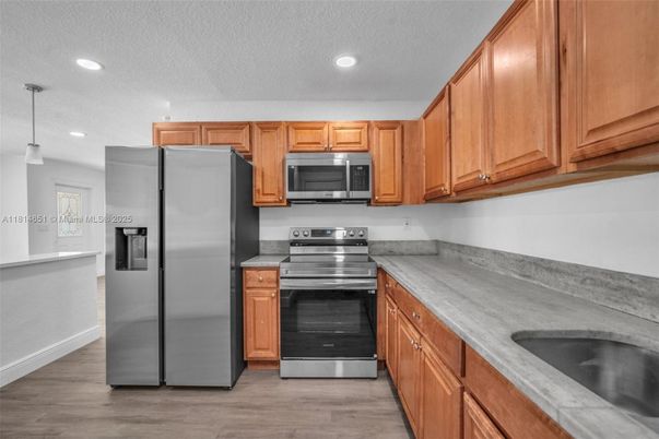 Interior, Kitchen, Pendant Lights, Recessed Lighting, Stainless Steel Appliances, Wood Texture Flooring