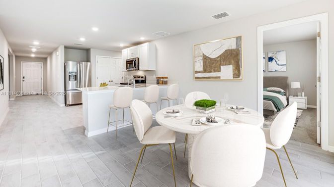 Dining room, Interior, Kitchen, Recessed Lighting, Stainless Steel Appliances, Wood Texture Flooring