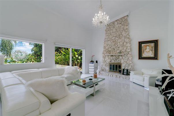 Chandelier, Fireplace, Interior, Living room, Stone Walls