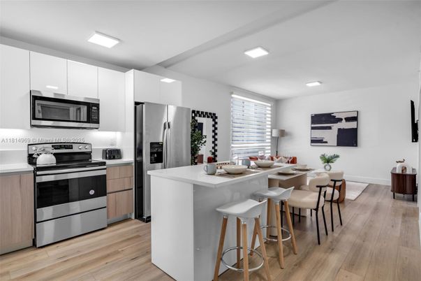 Dining room, Interior, Kitchen, Recessed Lighting, Stainless Steel Appliances, Wood Texture Flooring