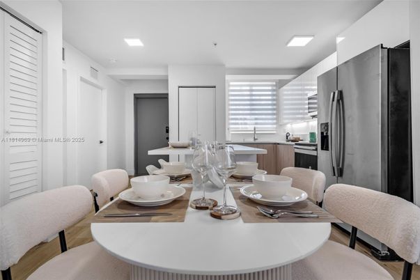 Dining room, Interior, Kitchen, Recessed Lighting, Stainless Steel Appliances, Wood Texture Flooring