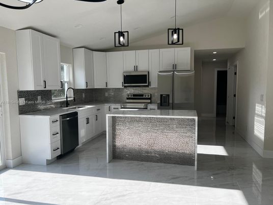 Interior, Kitchen, Marble, Pendant Lights, Recessed Lighting, Stainless Steel Appliances