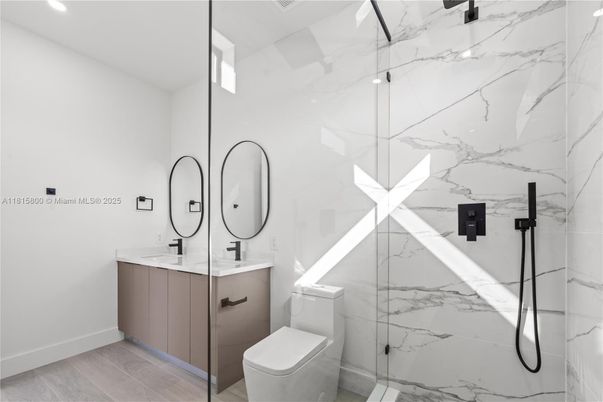 Bathroom, Glass Shower, Interior, Marble Walls, Recessed Lighting, Wood Texture Flooring