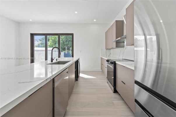 Interior, Kitchen, Recessed Lighting, Stainless Steel Appliances, Wood Texture Flooring