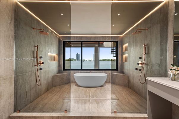 Bathroom, Free Standing Baths, Glass Shower, Interior, Marble, Marble Walls, Recessed Lighting, Water