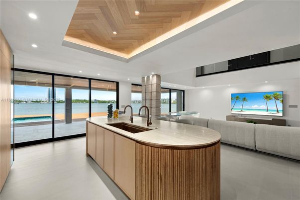 Dining room, Interior, Kitchen, Living room, Recessed Lighting, Water, Wooden Ceilings
