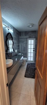Bathroom, Dual Sink Vanities, Interior, Recessed Lighting, Wooden Walls