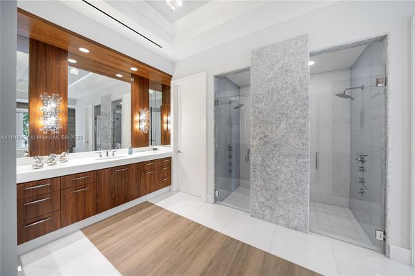 Bathroom, Dual Sink Vanities, Glass Shower, Interior, Recessed Lighting, Wood Texture Flooring