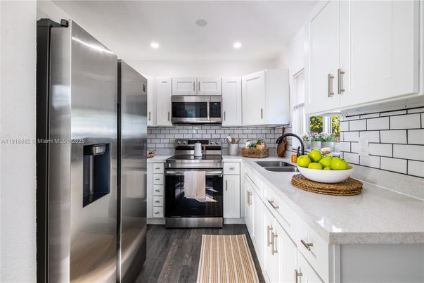 Interior, Kitchen, Recessed Lighting, Stainless Steel Appliances, Wood Texture Flooring