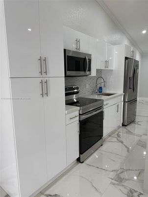 Interior, Kitchen, Marble, Recessed Lighting, Stainless Steel Appliances
