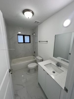 Bathroom, Dual Sink Vanities, Interior, Marble, Marble Walls, Recessed Lighting