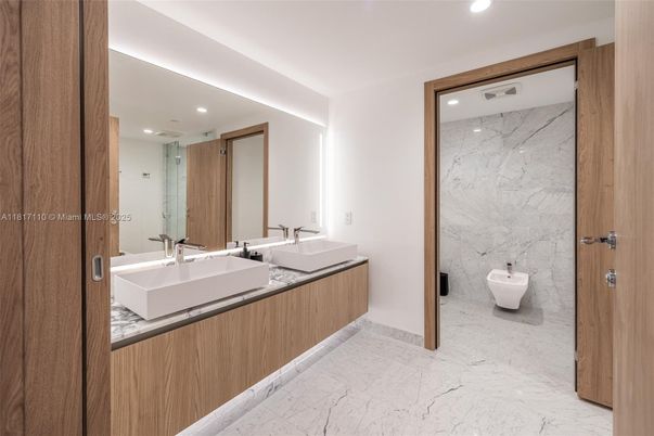 Bathroom, Dual Sink Vanities, Interior, Marble, Marble Walls, Recessed Lighting