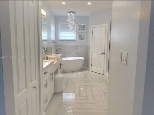 Bathroom, Dual Sink Vanities, Free Standing Baths, Interior, Marble, Pendant Lights, Recessed Lighting