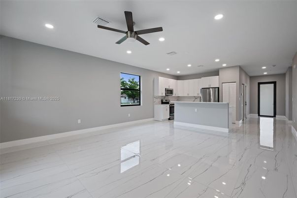Empty room, Interior, Kitchen, Marble, Recessed Lighting, Stainless Steel Appliances