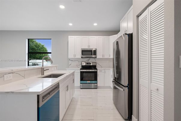 Interior, Kitchen, Marble, Recessed Lighting, Stainless Steel Appliances