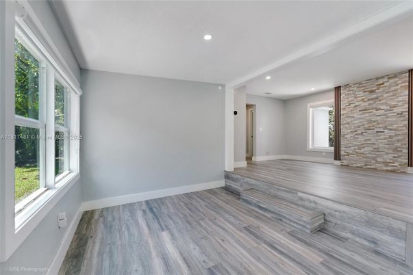 Empty room, Interior, Recessed Lighting, Stone Walls, Wood Texture Flooring