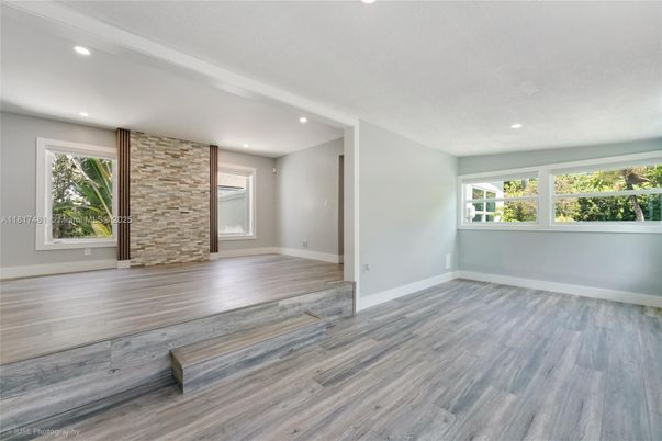 Empty room, Interior, Recessed Lighting, Stone Walls, Wood Texture Flooring