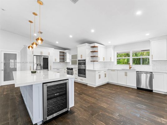 Interior, Kitchen, Pendant Lights, Recessed Lighting, Stainless Steel Appliances, Wood Texture Flooring
