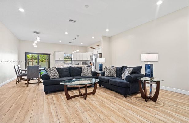 Dining room, Interior, Kitchen, Living room, Pendant Lights, Recessed Lighting, Stainless Steel Appliances, Wood Texture Flooring