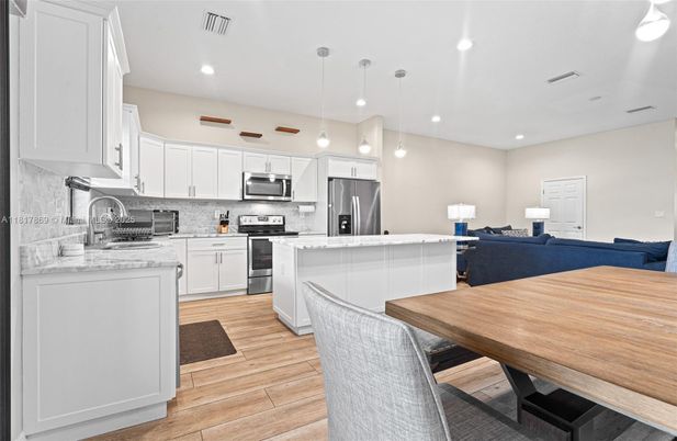 Interior, Kitchen, Living room, Pendant Lights, Recessed Lighting, Stainless Steel Appliances, Wood Texture Flooring
