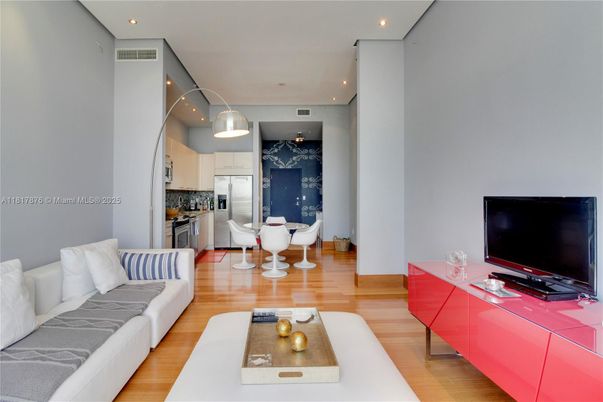 Dining room, Interior, Kitchen, Living room, Recessed Lighting, Stainless Steel Appliances, Wood Texture Flooring