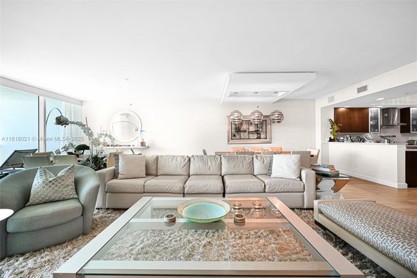 Chandelier, Interior, Kitchen, Living room, Pendant Lights, Recessed Lighting, Stainless Steel Appliances, Wood Texture Flooring