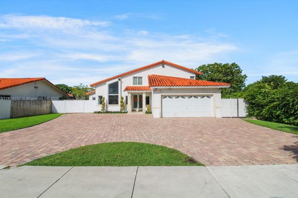 Attached, Backyard, Exterior, Facade, Spanish Mediterranean