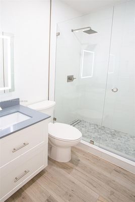 Bathroom, Glass Shower, Interior, Wood Texture Flooring