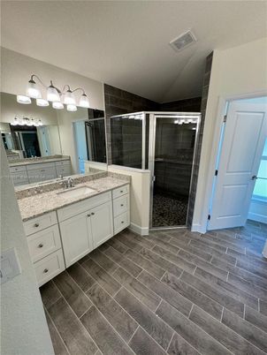 Bathroom, Dual Sink Vanities, Glass Shower, Interior, Wood Texture Flooring