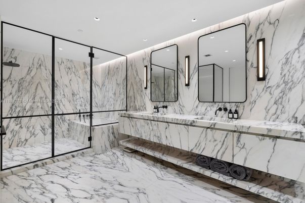Bathroom, Dual Sink Vanities, Glass Shower, Interior, Marble, Marble Walls, Recessed Lighting