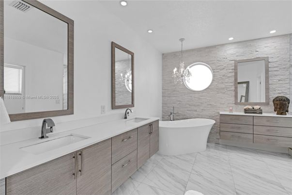 Bathroom, Chandelier, Dual Sink Vanities, Free Standing Baths, Interior, Marble, Pendant Lights, Recessed Lighting