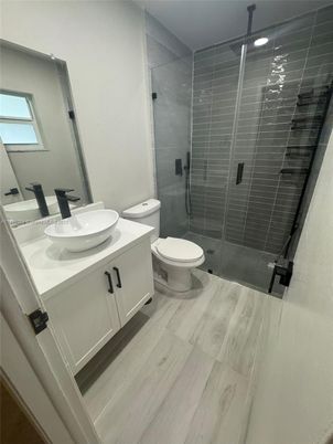 Bathroom, Glass Shower, Interior, Recessed Lighting, Wood Texture Flooring